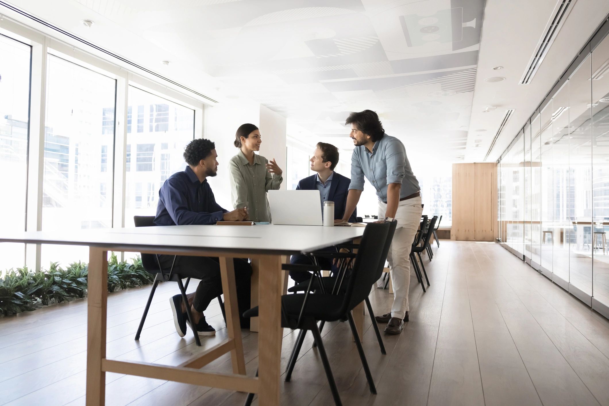 Advisors reviewing strategy at a meeting table