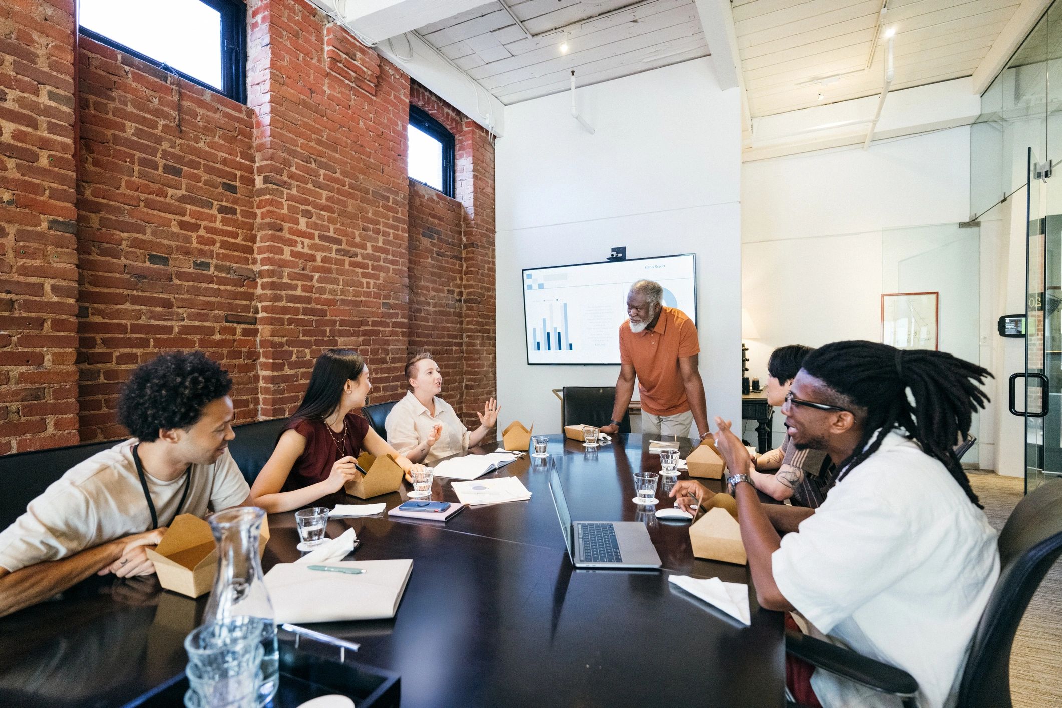 Executive team in a boardroom discussion