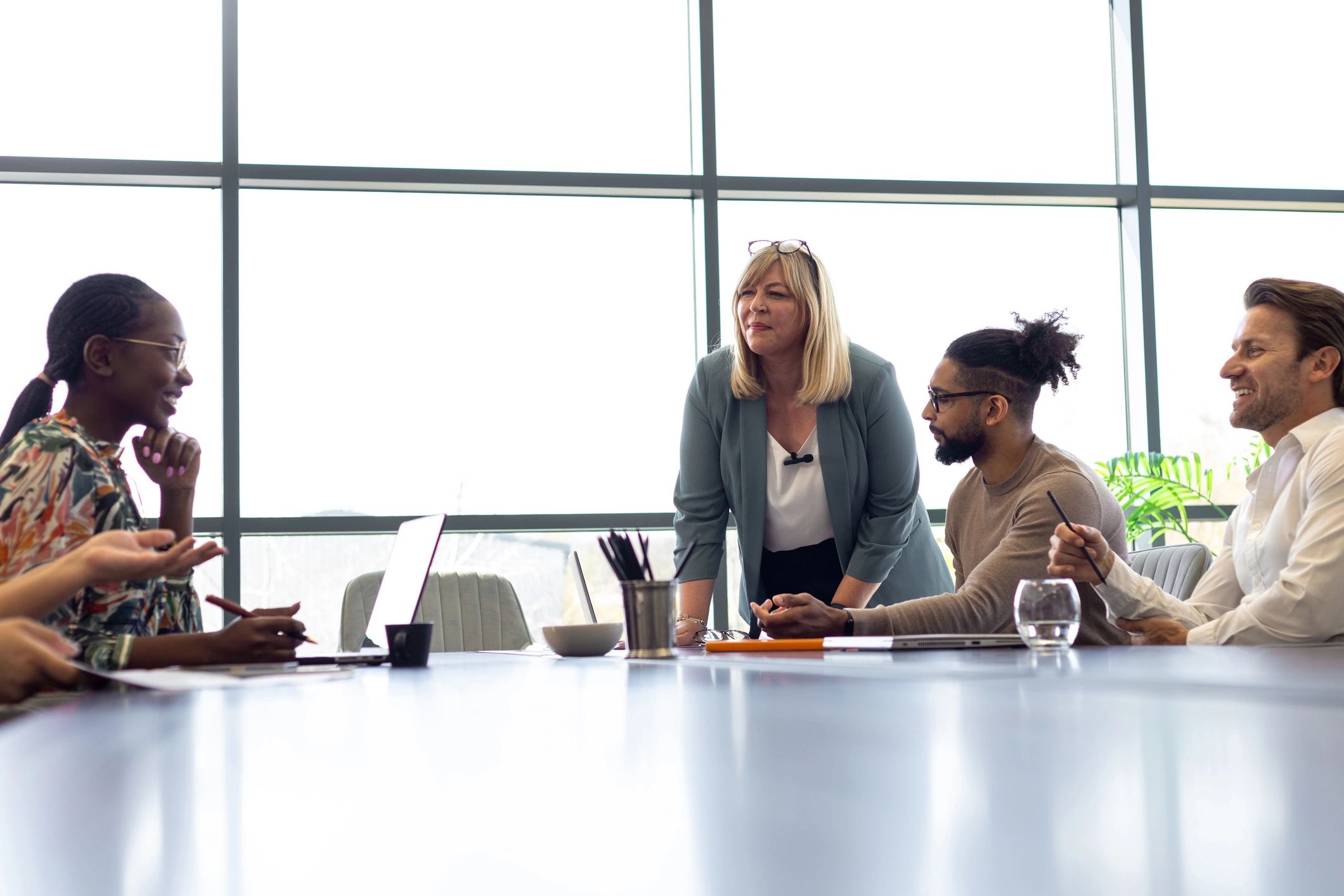 Executive team meeting in a corporate conference room